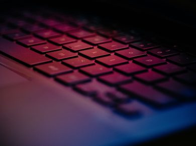 a-close-up-of-a-keyboard-with-a-blurry-background